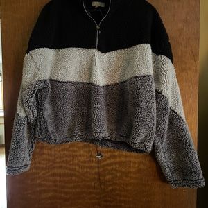 A woman’s cropped lightweight fleece